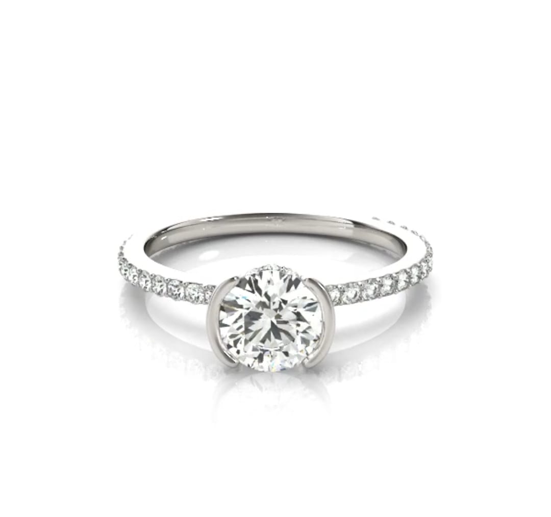 Front view of a 2 CT round cut lab grown diamond ring with a half-bezel setting and pavé band