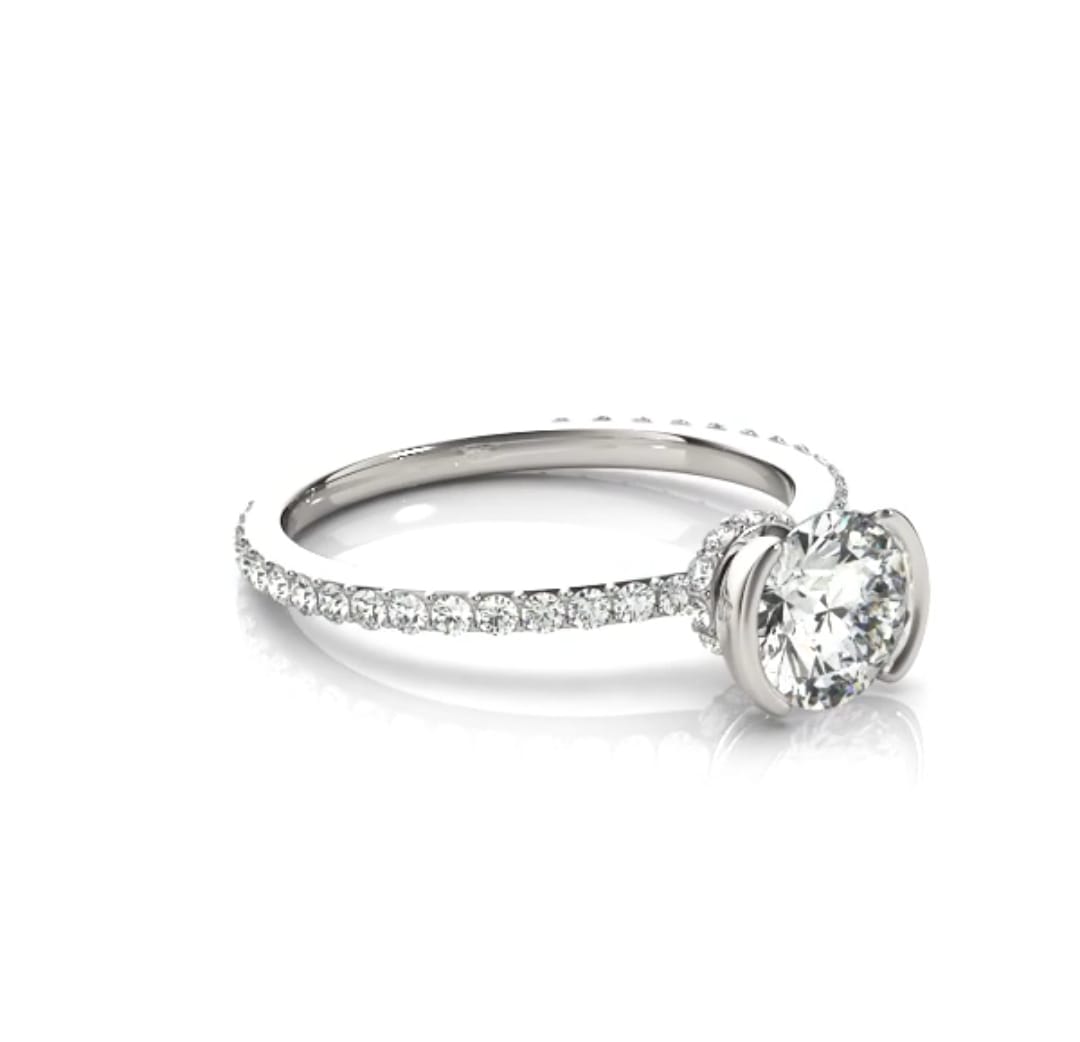 High-angle perspective view of a 2 CT round lab diamond with a sparkling pavé accent band
