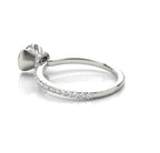 Reverse profile view showing the smooth lower shank and hidden pavé collar of the ring