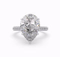 Top-down view of a 4 CT pear-cut lab-created diamond set in a white gold 5-prong setting.