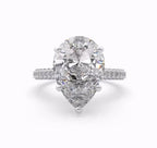 Top-down view of a 4 CT pear-cut lab-created diamond set in a white gold 5-prong setting.