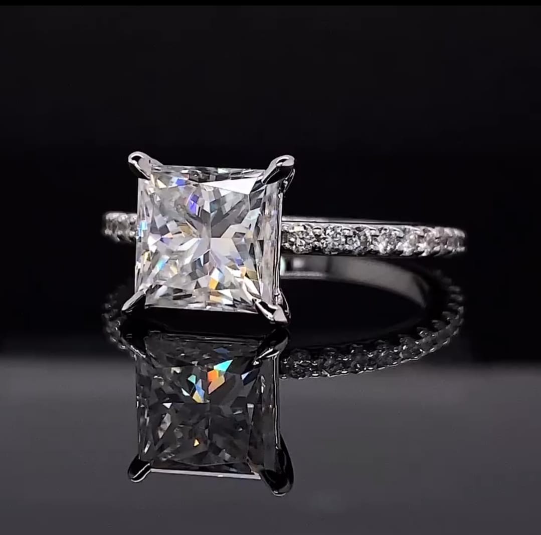 Front view of a 2 CT princess cut lab diamond engagement ring in white gold with pavé accents.