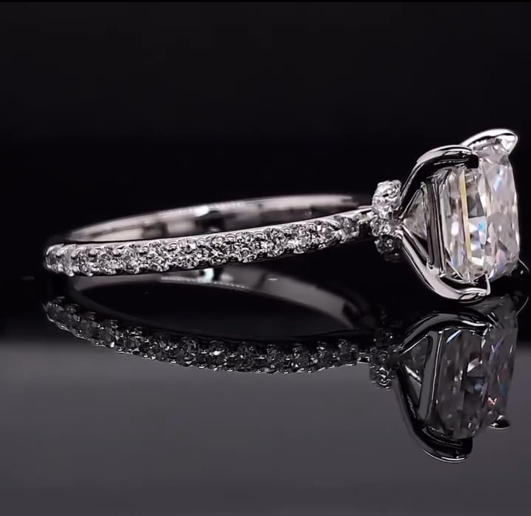 Close-up side profile showing the delicate hidden halo setting and micro-pavé band.