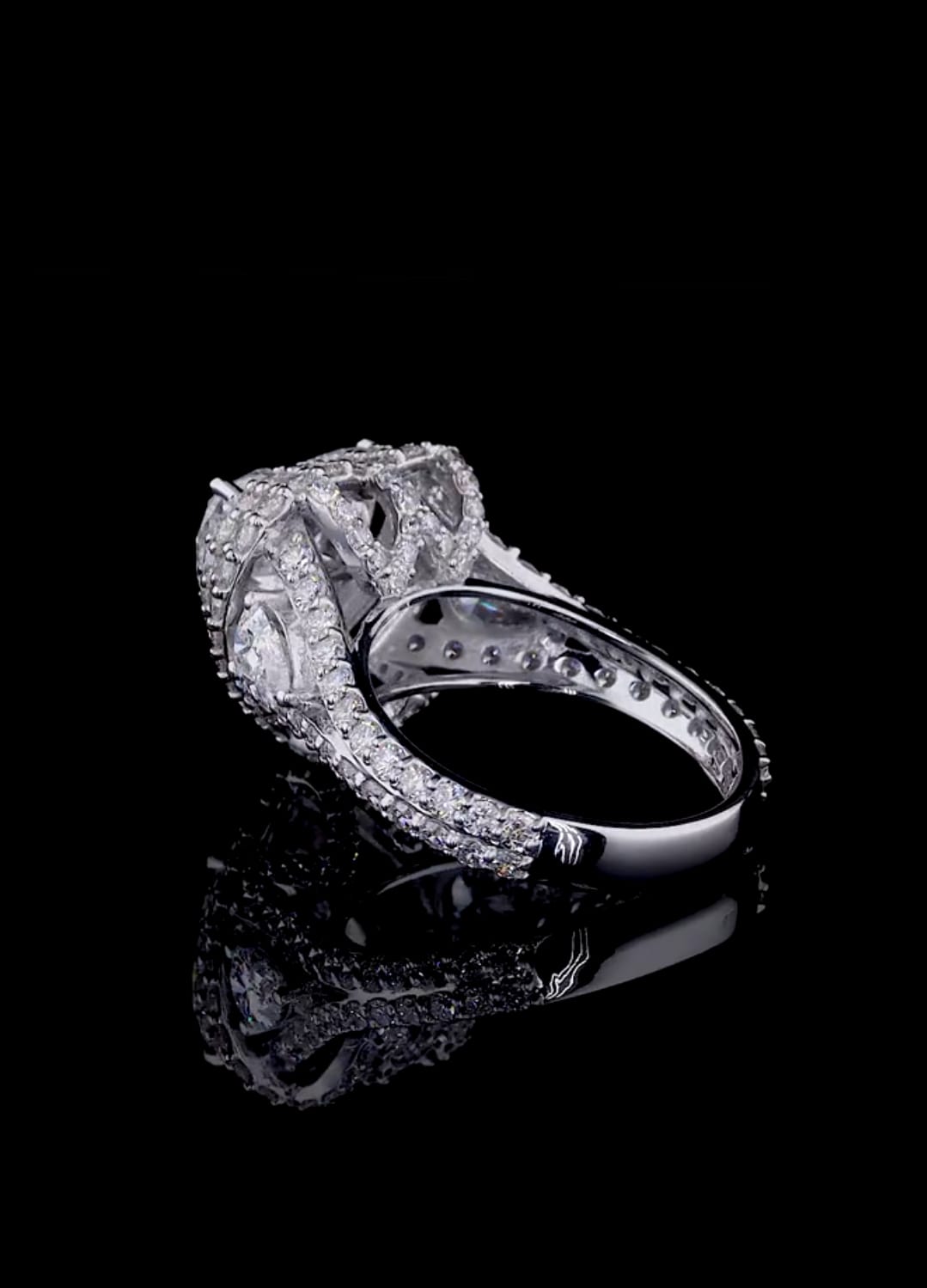 Underside view displaying the intricate basket and double-row pavé band craftsmanship of a heart diamond ring.