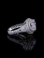 Angled side profile detailing the multi-row diamond split band and double halo crown of the heart ring.