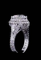 Vertical side profile highlighting the height, pear accent diamond, and pavé setting of a 4 carat heart diamond ring.