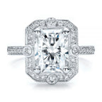Close-up macro photograph of a 3 carat radiant cut lab grown diamond vintage milgrain halo engagement ring.