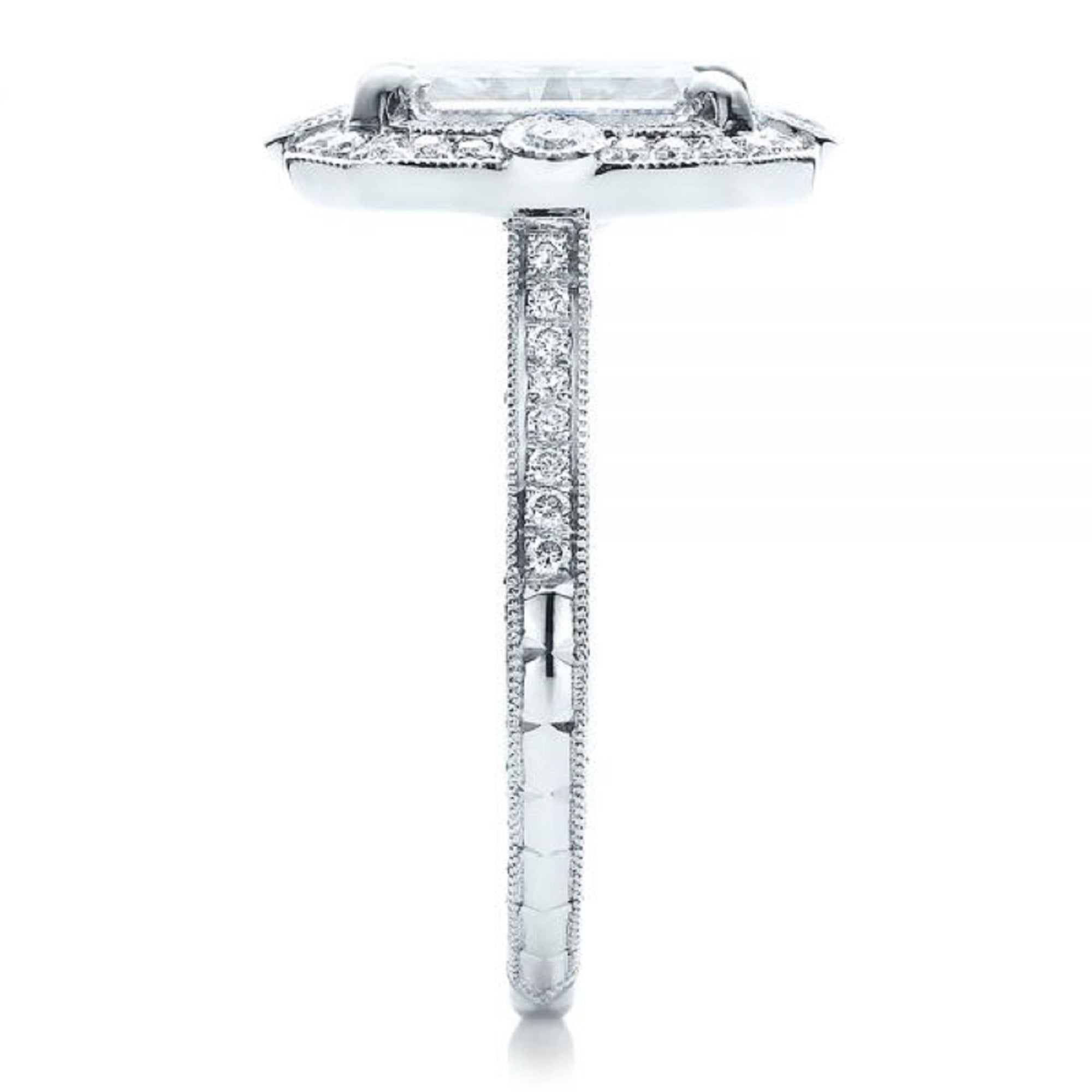 Straight-on top profile view of a radiant cut halo ring detailing the pave band and bezel compass points.