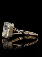 Side view displaying the split-shank band and sleek bezel setting of the 3 carat radiant diamond ring