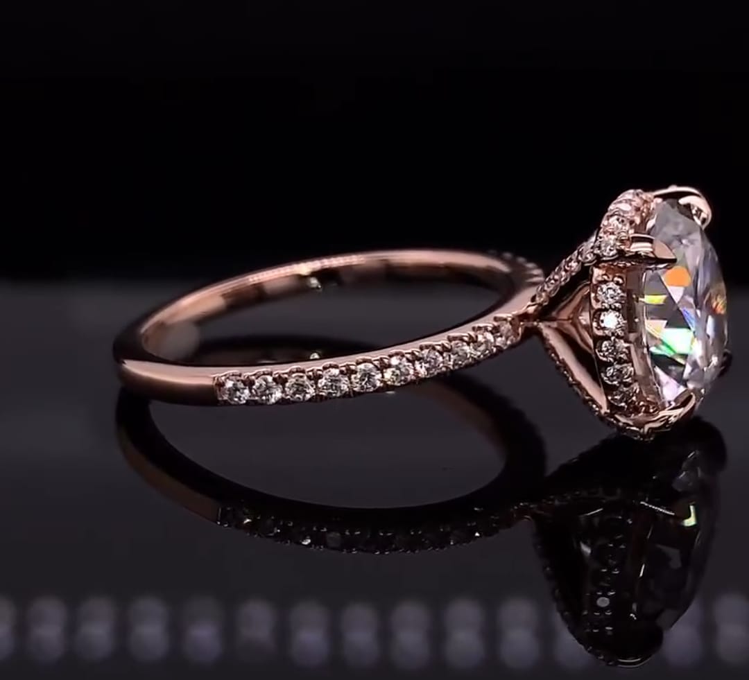 Side profile view showcasing the sparkling hidden halo under-gallery and diamond pave band