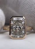 Close-up shot of a 5 CT radiant lab diamond ring showing exceptional facet fire and bezel craftsmanship