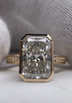 Close-up shot of a 5 CT radiant lab diamond ring showing exceptional facet fire and bezel craftsmanship