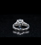 Under gallery view showing the four prong setting and smooth inner band of a 3CT round lab diamond white gold ring