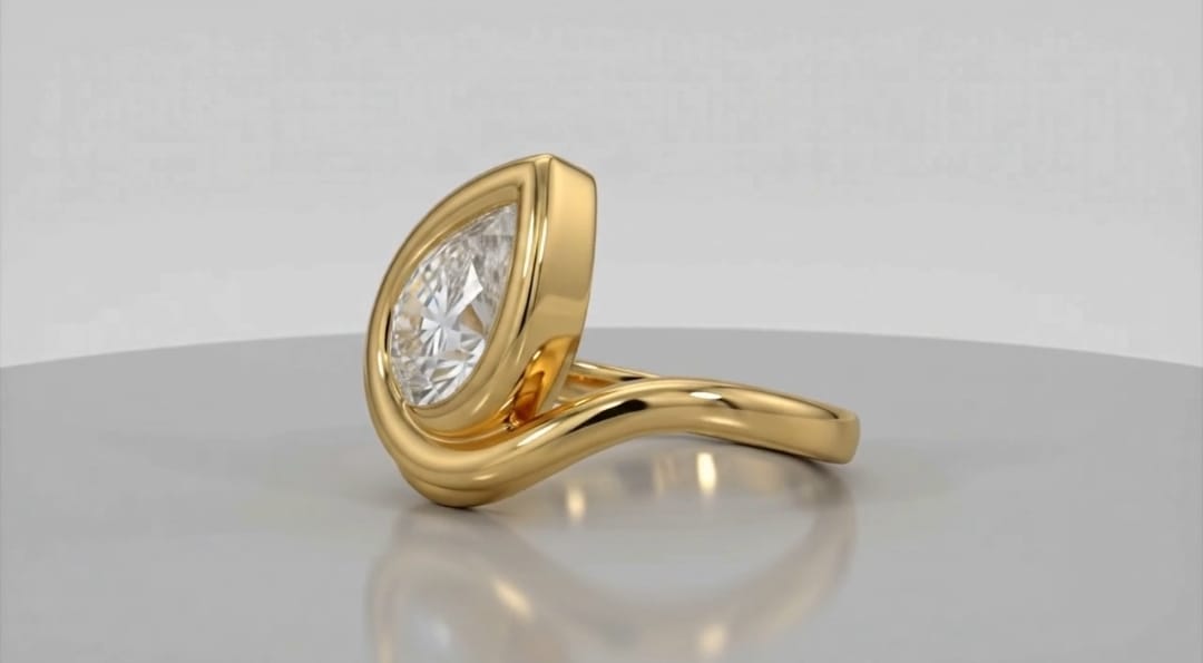 Detailed side view displaying the swooping bypass shank and secure bezel setting