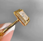 Side angle view of a 3 carat princess cut lab grown diamond ring with square halo frame in yellow gold