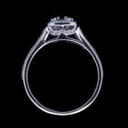 Side profile view showing the halo basket construction and thin band of a 3 carat cushion cut lab diamond ring