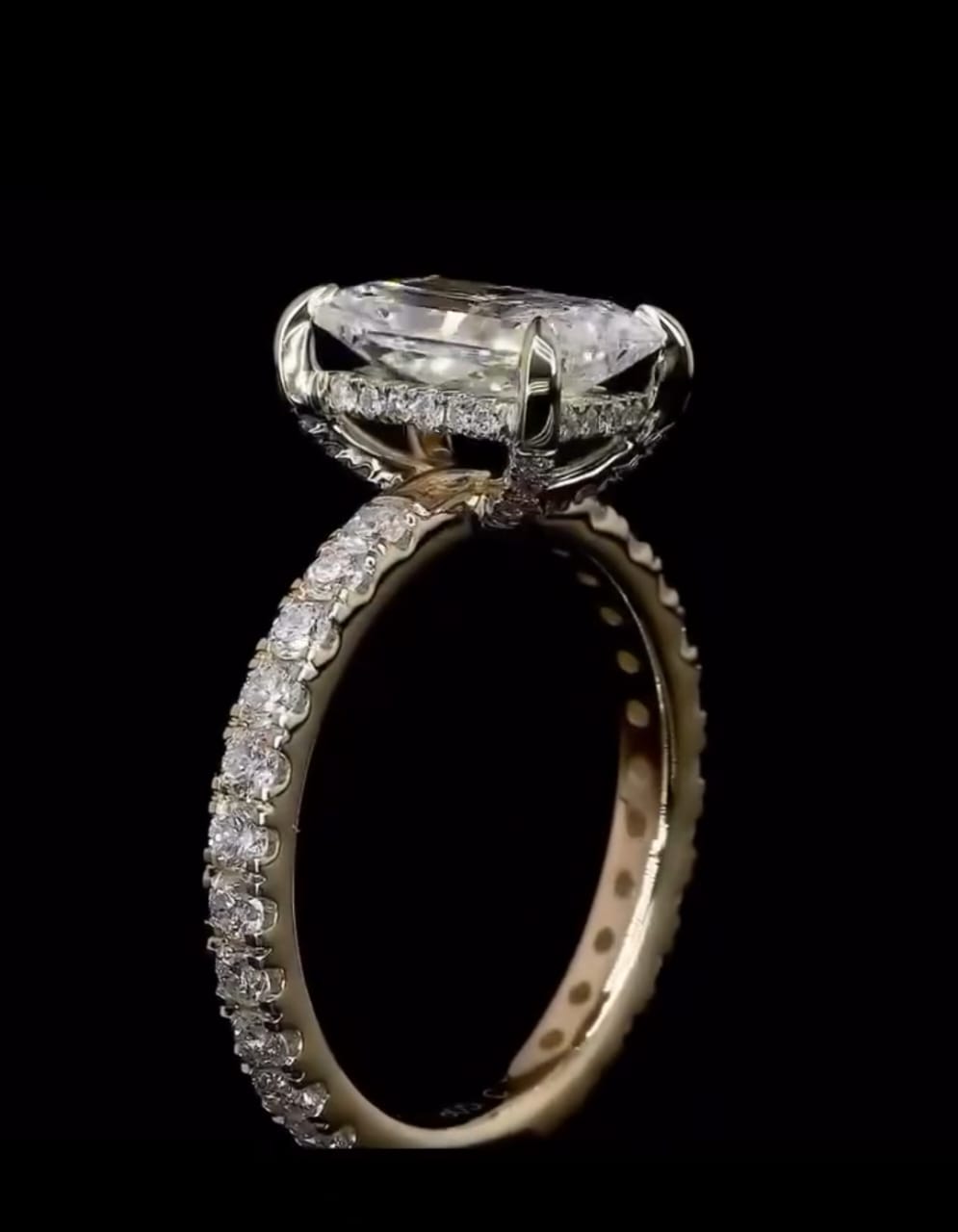 Close-up side view highlighting the hidden halo and pavé-detailed prongs on a 2 CT elongated radiant lab grown diamond ring
