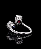 Bottom-up view displaying the band structure and secret gemstone accents under the twin pear basket settings