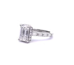 Side angle showing the crisp step-cut facets of a 3 carat emerald lab diamond setting