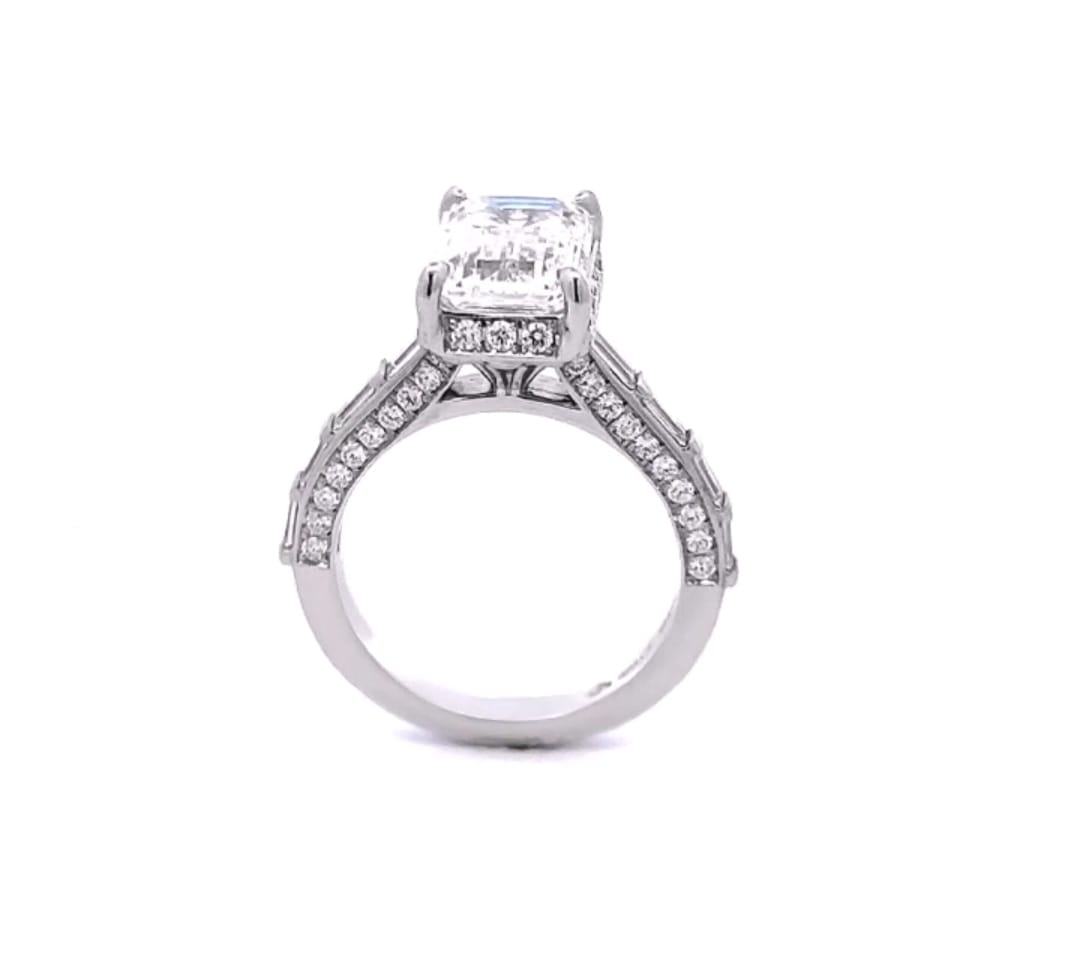 Profile view showcasing the side-paved diamond bridge and baguette channel band structure