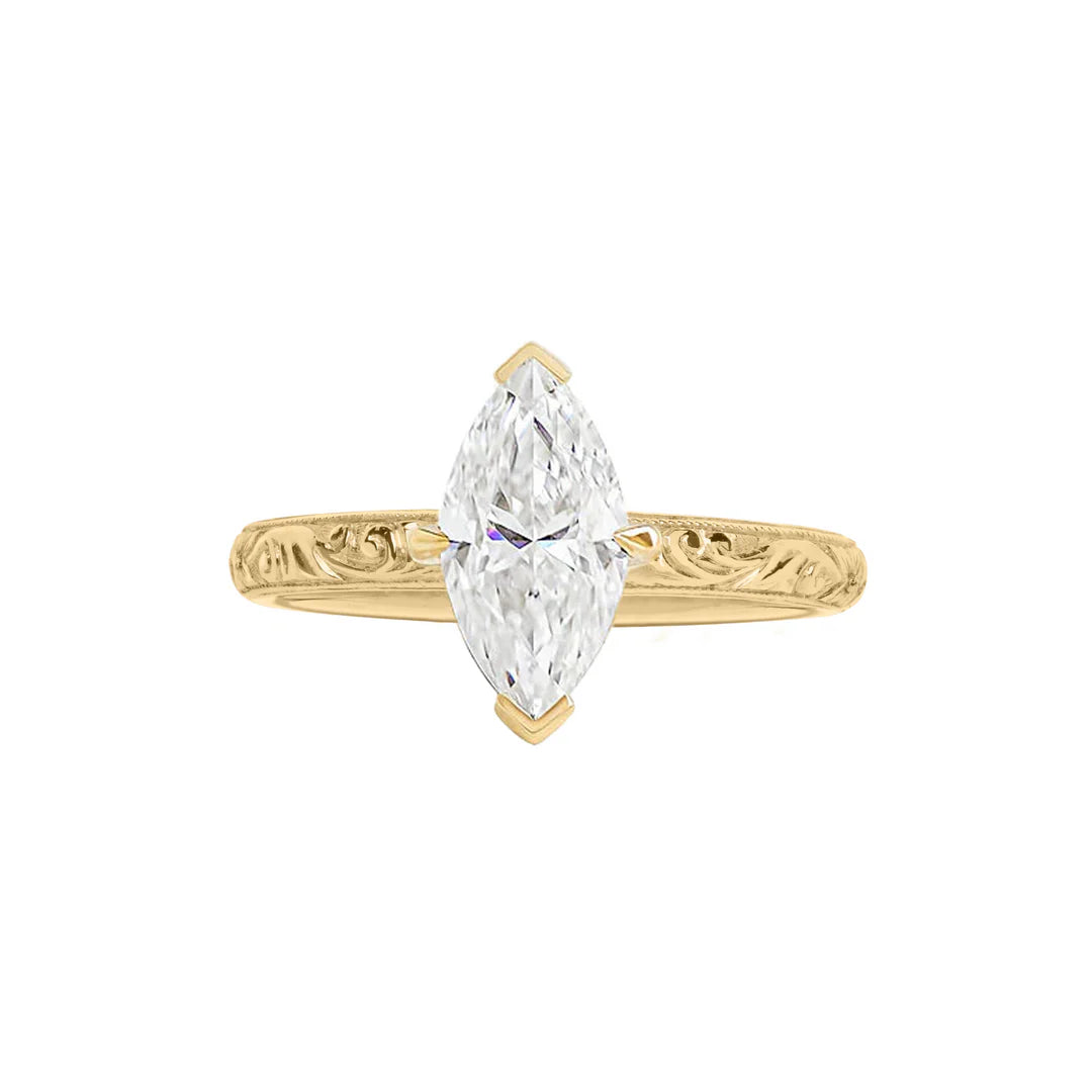Top view of 2 CT Marquise Cut Lab Diamond Solitaire Ring in 14K Yellow Gold with intricate scroll engraving