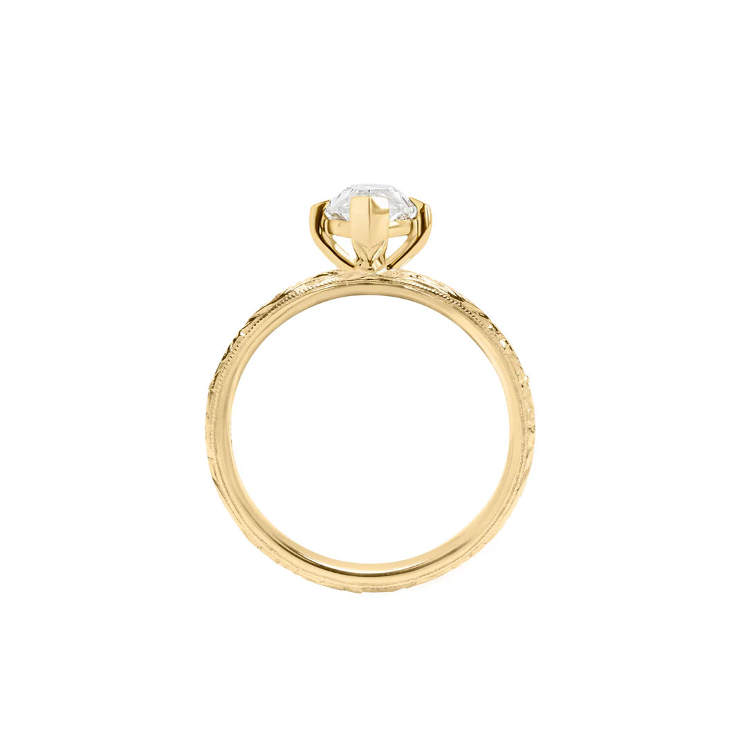 Side profile view showing the basket and prong setting of 2 CT Marquise Cut Lab Diamond Ring with engraved shank
