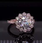 Top-down view highlighting brilliant 3 CT Round Cut Lab Diamond surrounded by a flower petal halo