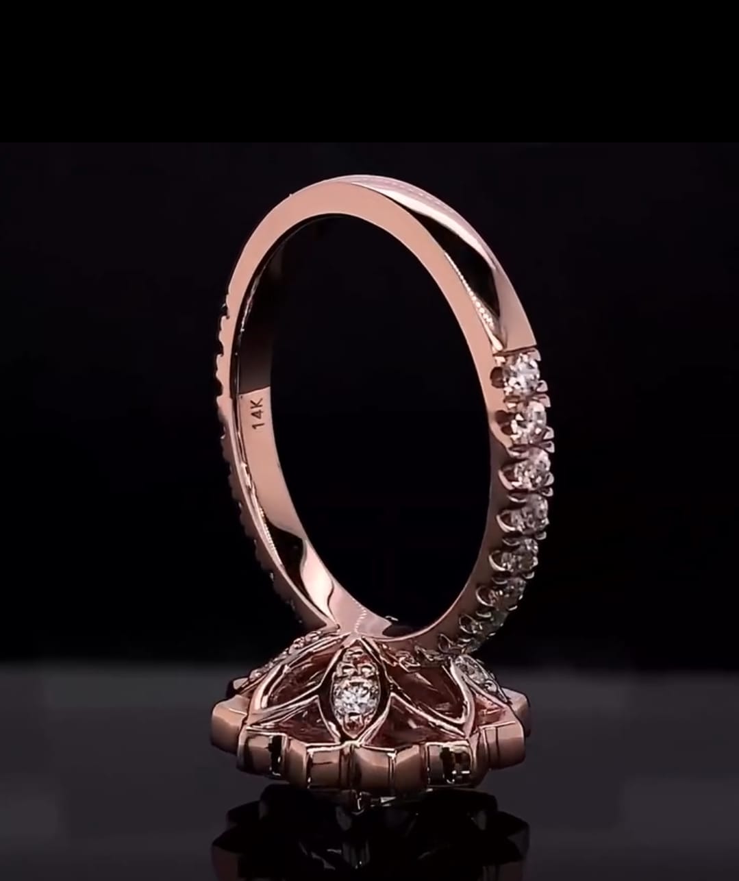 Detailed view of 14K stamp and petal-carved undergallery with surprise accent diamond on lab diamond halo ring