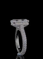 Profile view of 4 CT Emerald Cut Lab Grown Diamond Ring with hidden halo collar and multi-row pavé band