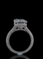 Side profile view highlighting the pavé struts and full diamond band of a 4 CT emerald cut lab diamond ring