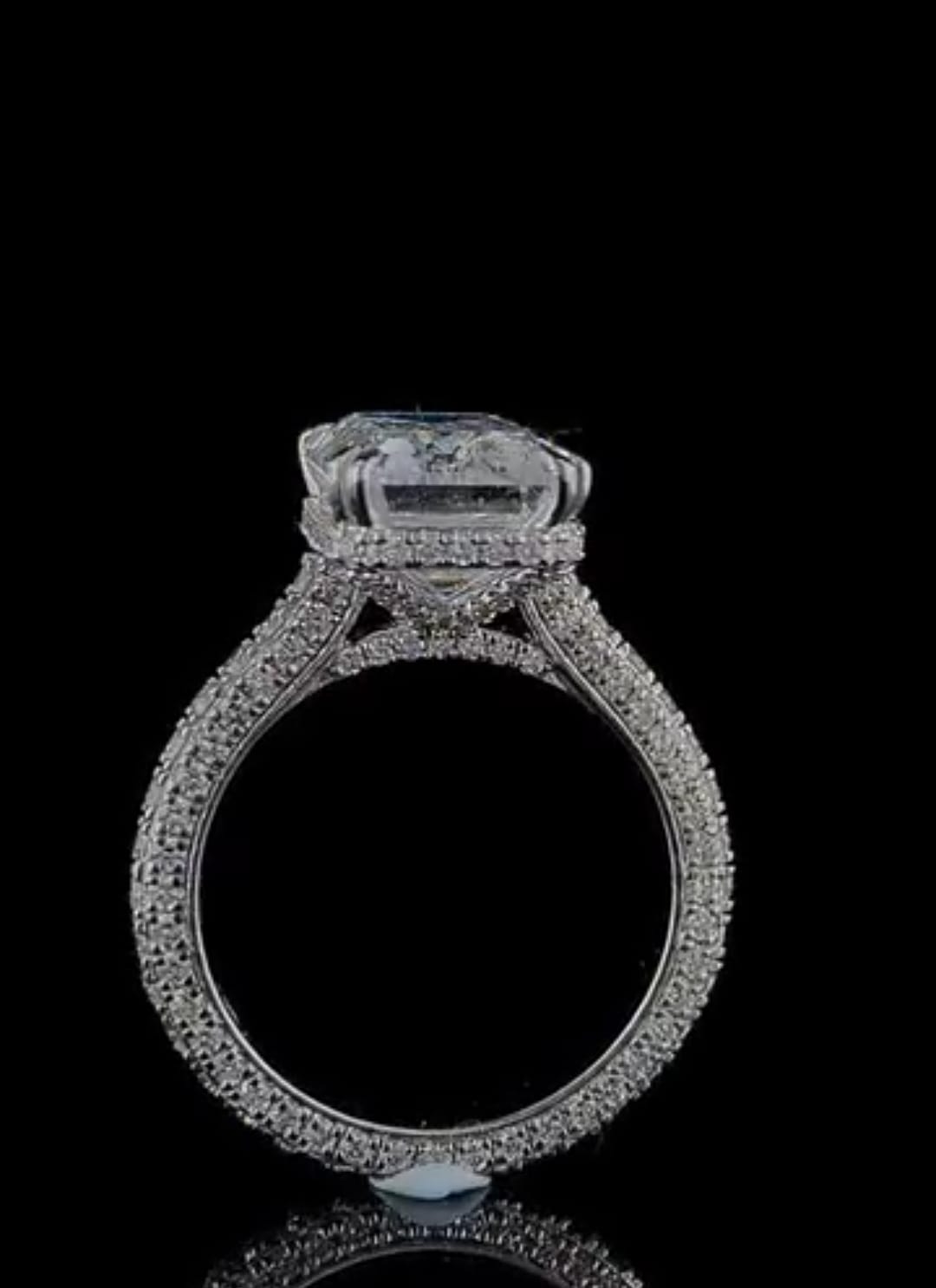 Side profile view highlighting the pavé struts and full diamond band of a 4 CT emerald cut lab diamond ring