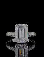 Top-down view showing the clean step-cut facets of a 4 Carat Emerald Cut Lab Diamond Ring in 14K White Gold