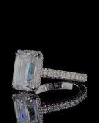 Reflective view showing the clarity of a 4 CT Emerald Cut Lab Diamond with 14K gold hallmark stamp