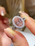 Close-up view of 3 CT Fancy Pink Oval Cut Lab Grown Diamond Ring with double white diamond halo