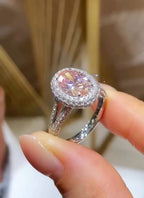 Side angle view showing the pavé split-shank band and elevated double halo on a 3 CT pink lab diamond ring