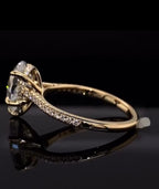 Side profile view of 3 CT Pear Cut Lab Diamond Ring in 14K yellow gold showing hidden halo collar