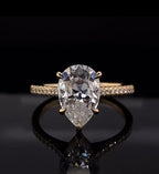 Front top view showing brilliant teardrop shape of a 3 CT Pear Cut Lab Diamond Ring in yellow gold