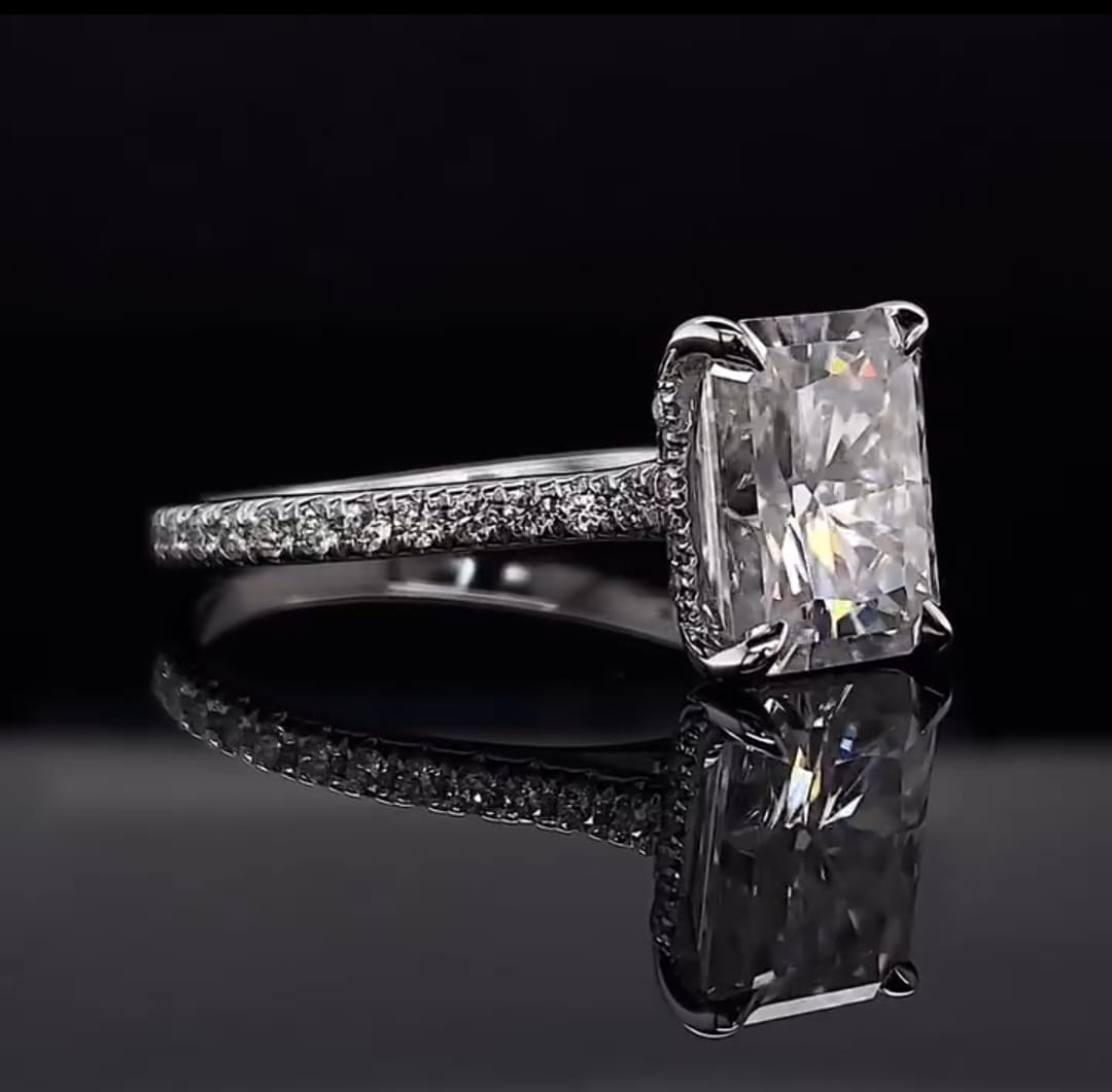 Highlighting double claw prongs and brilliance of a 3 Carat Radiant Cut Lab Diamond Engagement Ring