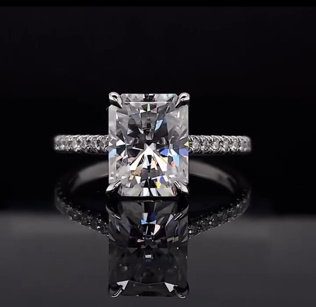 Direct front perspective showcasing the table and facets of a 3 CT Elongated Radiant Cut Lab Diamond Ring