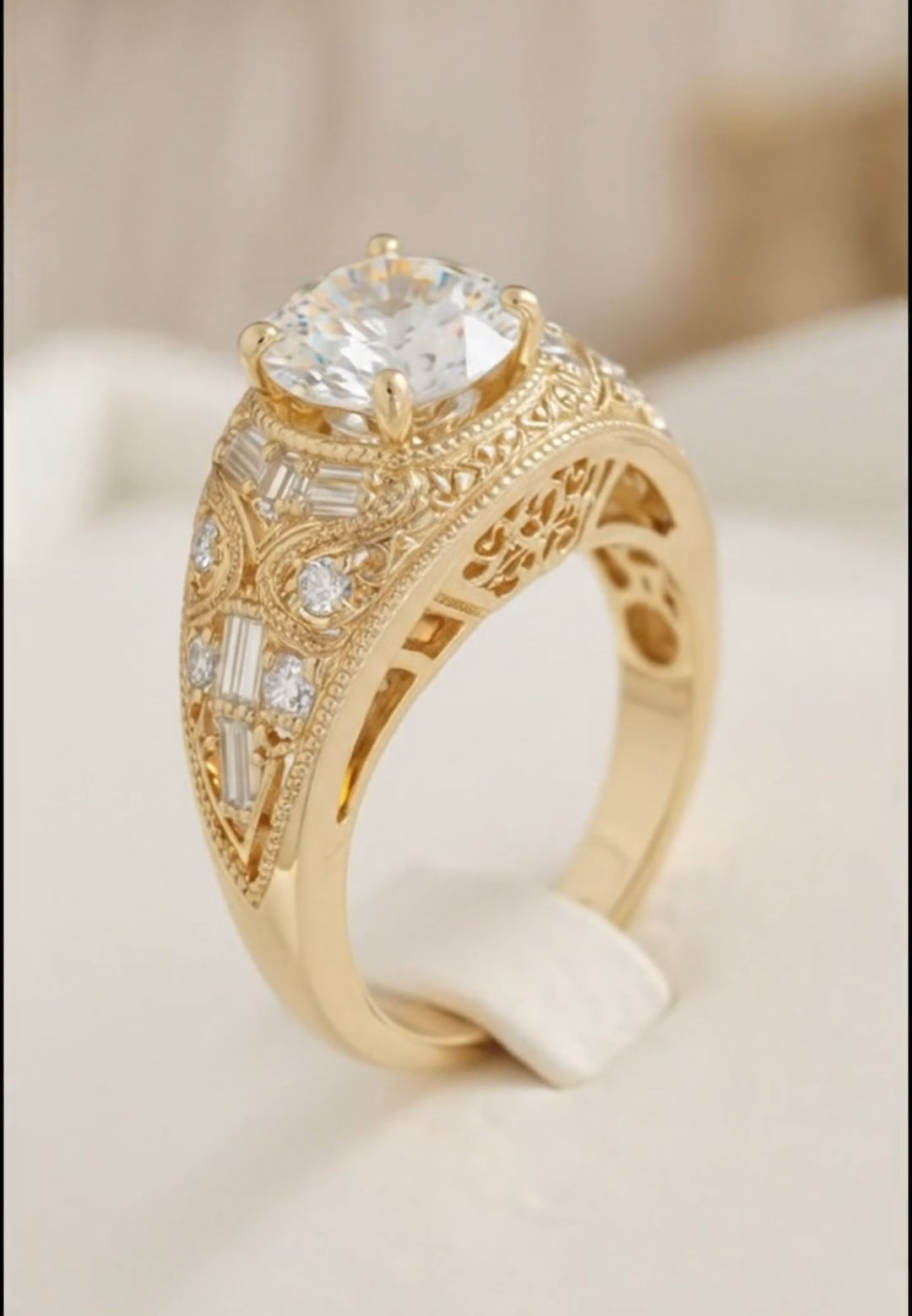 Yellow Gold antique-style gold ring highlighting the ornate engraved filigree patterns, baguette cuts,