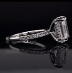 Side profile view showing micro-pavé hidden halo basket and band on a 3 CT Emerald Cut Lab Diamond Ring