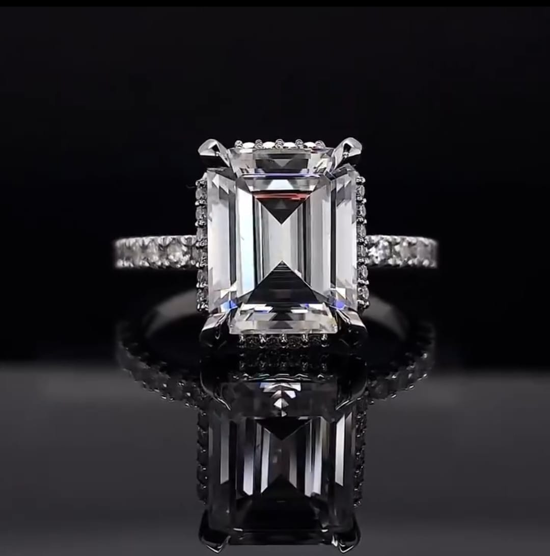 Direct top view showcasing step-cut facets and clarity of a 3 CT Emerald Cut Lab Diamond Ring in white gold