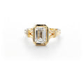 Direct top view of 2 carat emerald cut lab grown diamond ring in a gold bezel setting