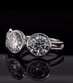Perspective view showcasing the brilliant fire and smooth bezel setting of a three-stone lab diamond ring