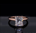 Front view of 3 CT radiant cut lab grown diamond engagement ring in rose gold with engraved band