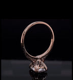 Side perspective highlight of the rose gold basket gallery and 3 carat radiant lab diamond