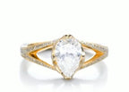 Top view of 2 CT pear cut lab grown diamond engagement ring on a yellow gold split shank band