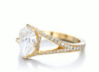 Side view highlighting the milgrain detailing and split-shank accent diamonds