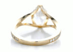 Back angle showing the smooth yellow gold lower band and split-shank transition