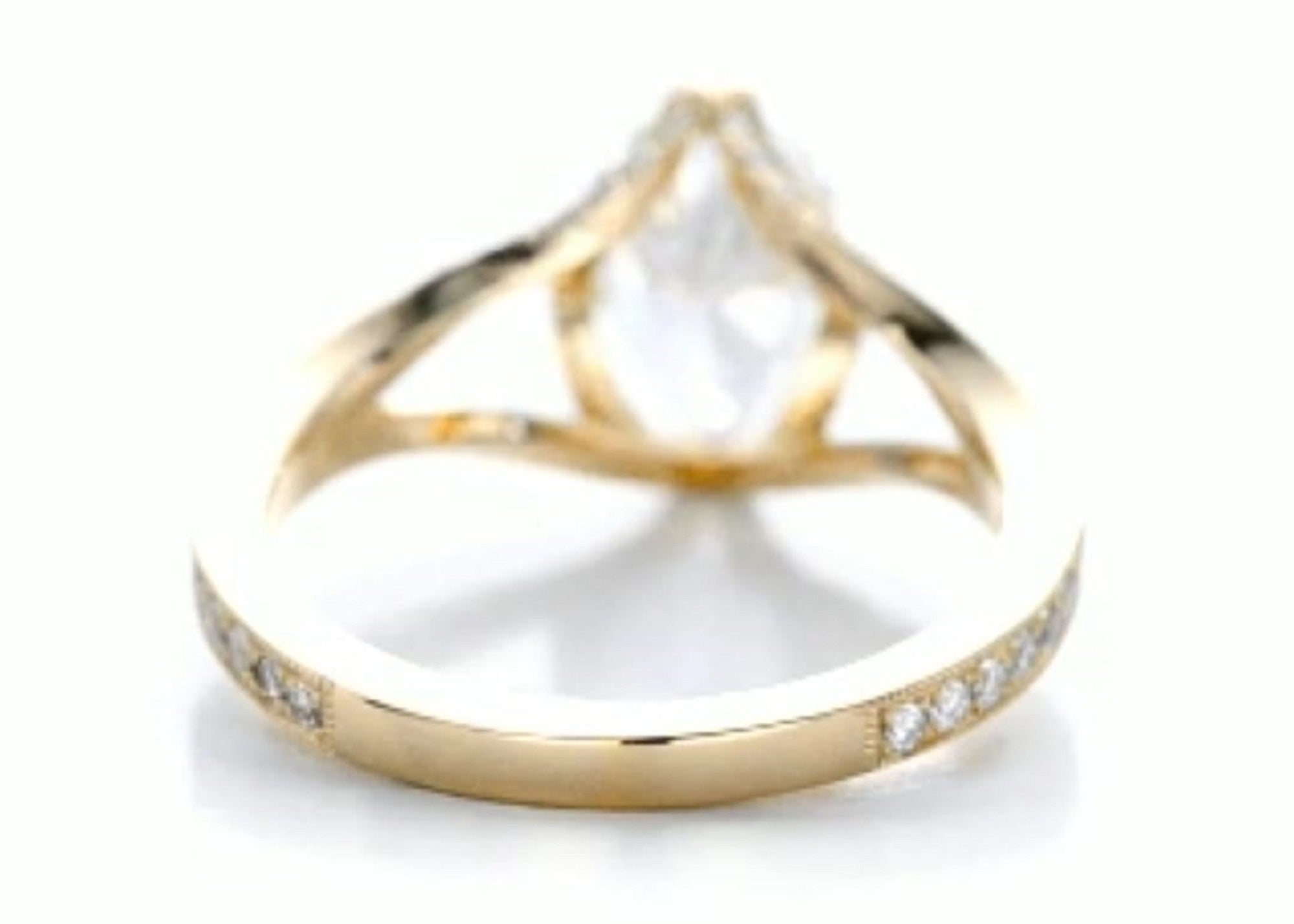 Back angle showing the smooth yellow gold lower band and split-shank transition